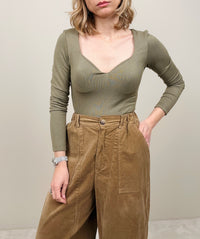 Body verde a mini costine