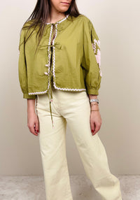 Jeans burro con chiusura svasata