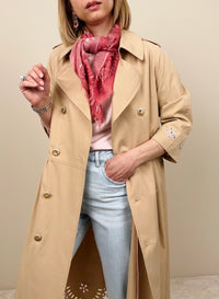 Trench con ricami