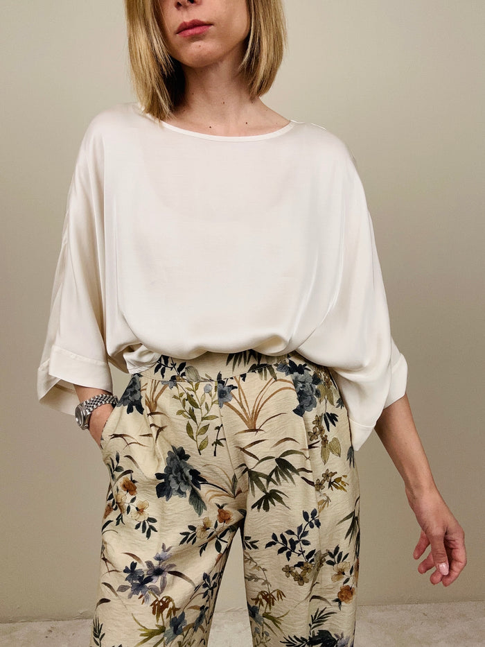Blusa taglio over