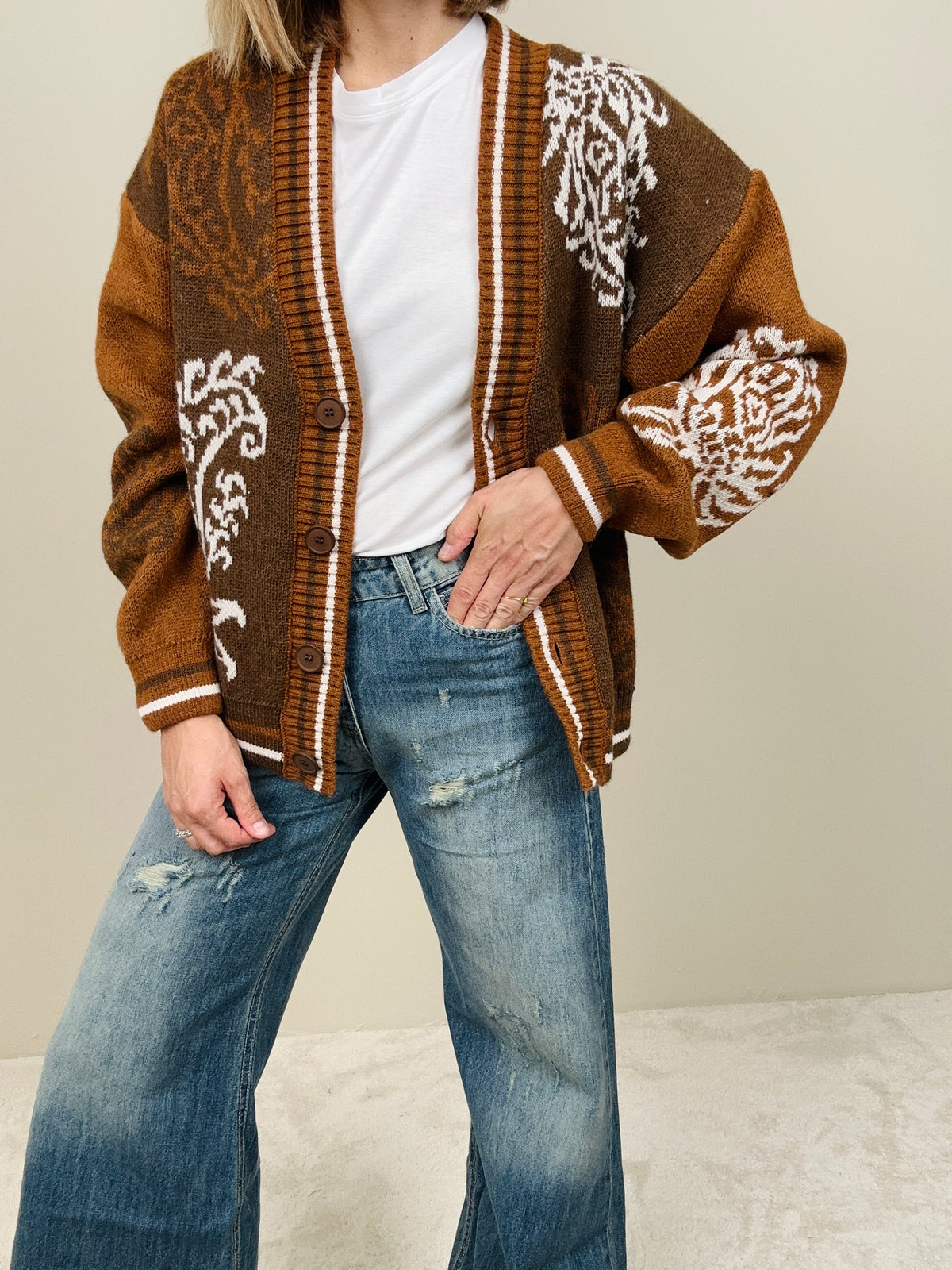 Cardigan fantasia con bottoni