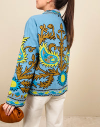 Giacca azzurra ricamata