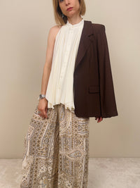 Top smanicato con bottoni