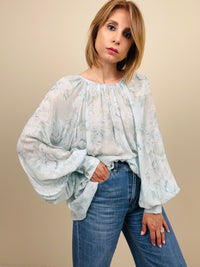 Blusa fiori azzurra