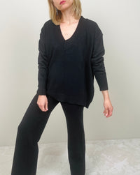 Tuta in maglia con scollo (più colori)