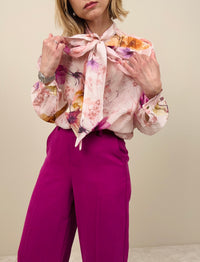 Camicia floreale rosa con fiocco