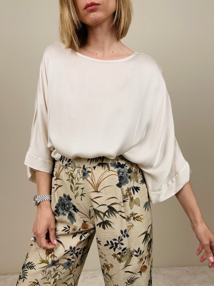 Blusa taglio over