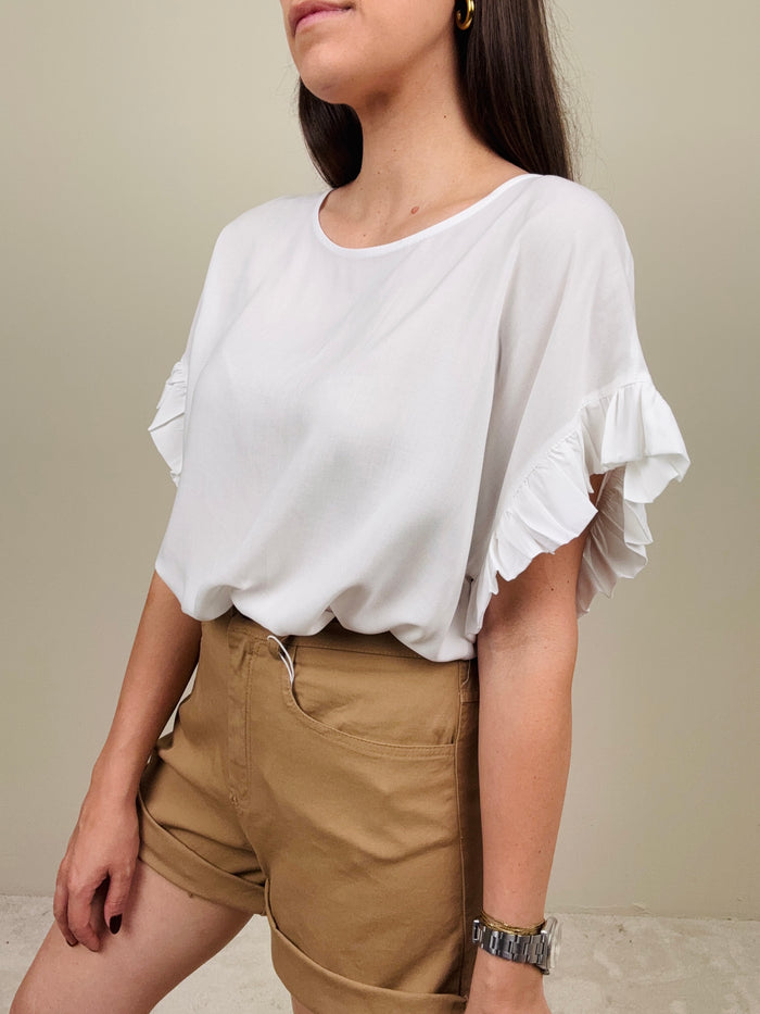 Blusa con manichetta a ruches