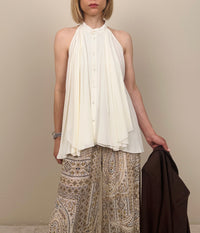 Top smanicato con bottoni