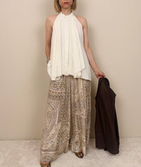 Pantalone in fantasia nei toni chiari