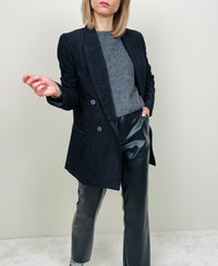 Pantalone a trombetta in ecopelle