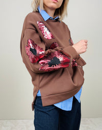Felpa over con fiori