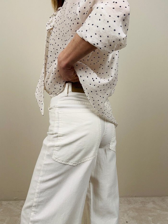 Jeans bianco con gamba larga