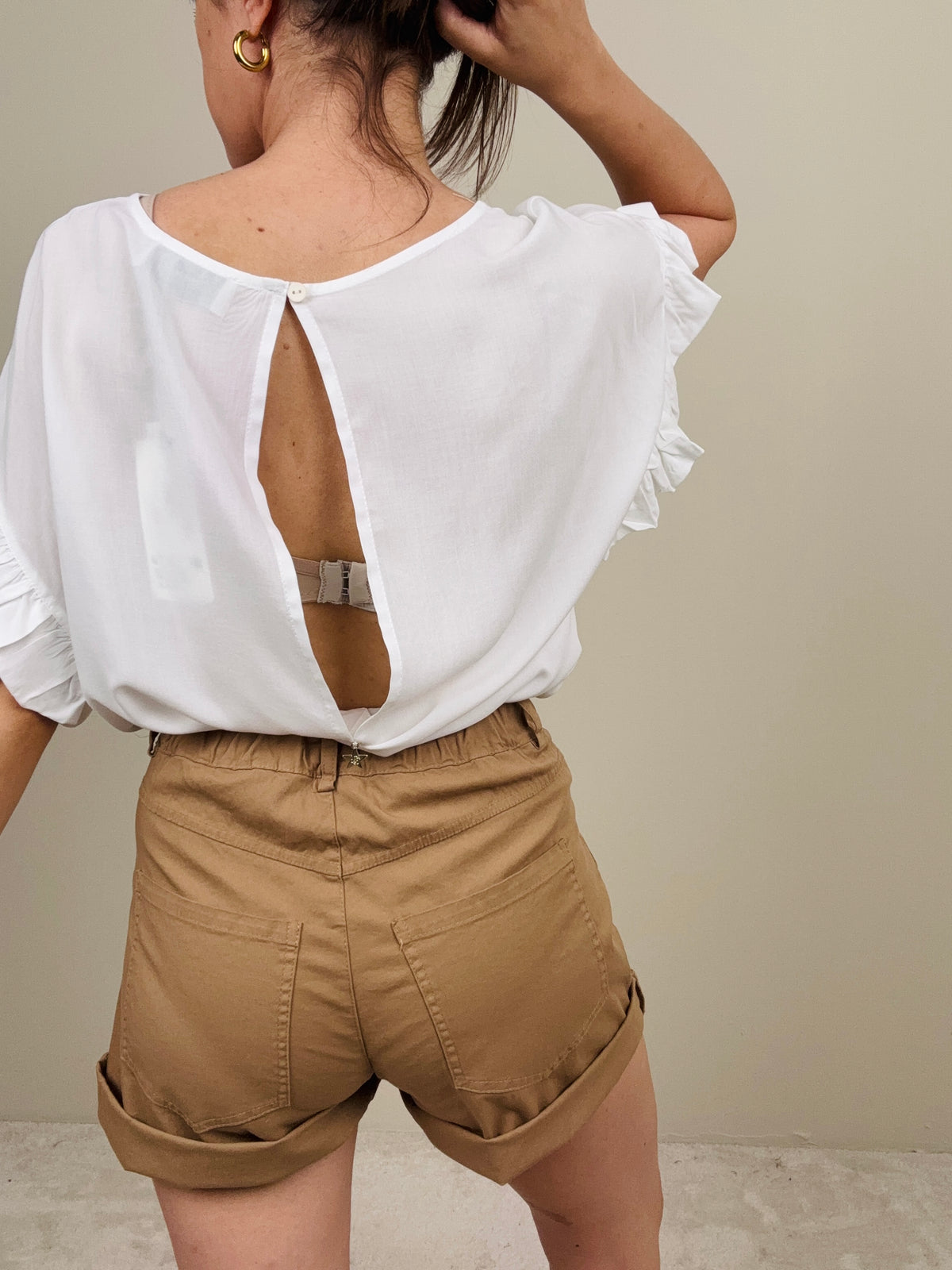 Blusa con manichetta a ruches