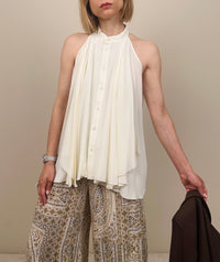 Top smanicato con bottoni