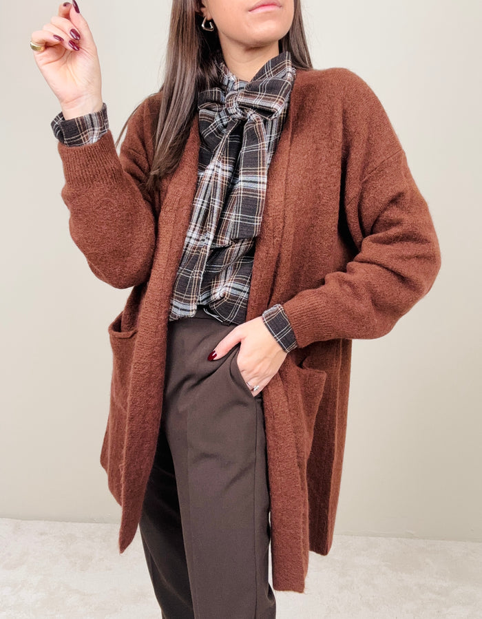 Cardigan bruciato con bottone singolo