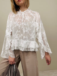 Camicia bianca lavorata tono su tono