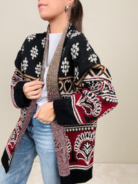 Cardigan fantasia nera