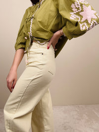 Jeans burro con chiusura svasata