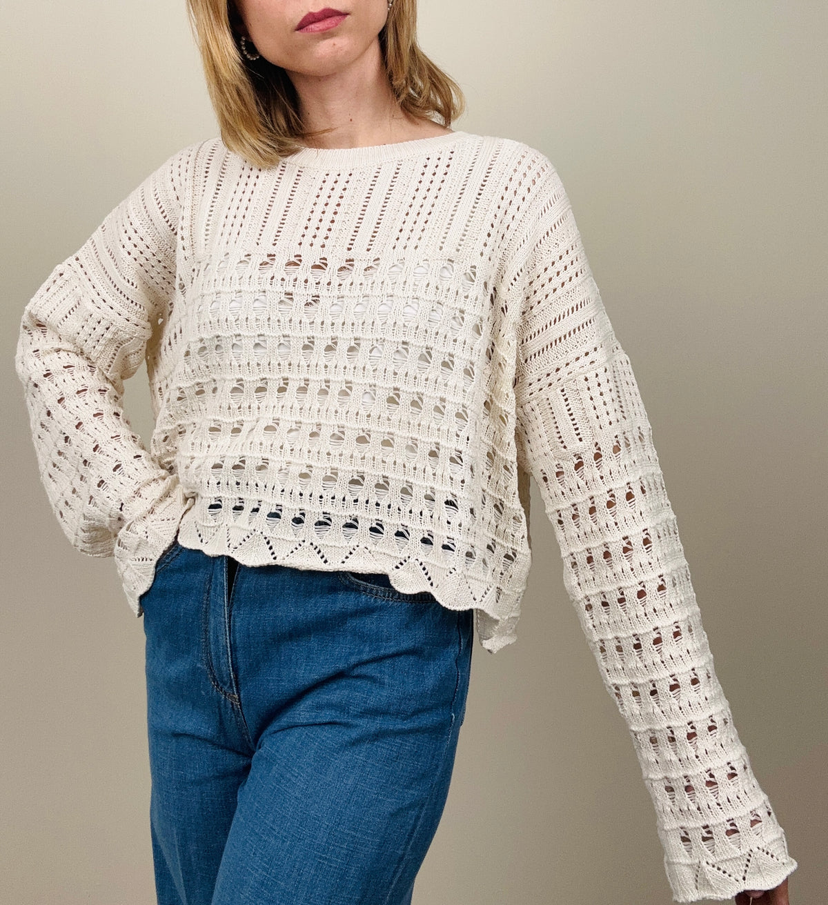 Maglia aperta dietro burro