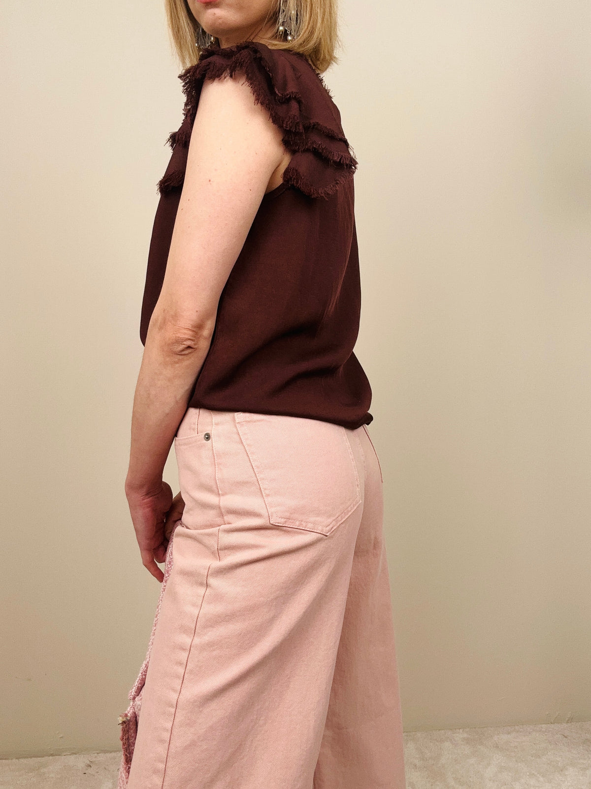 Jeans rosa con chiusura svasata