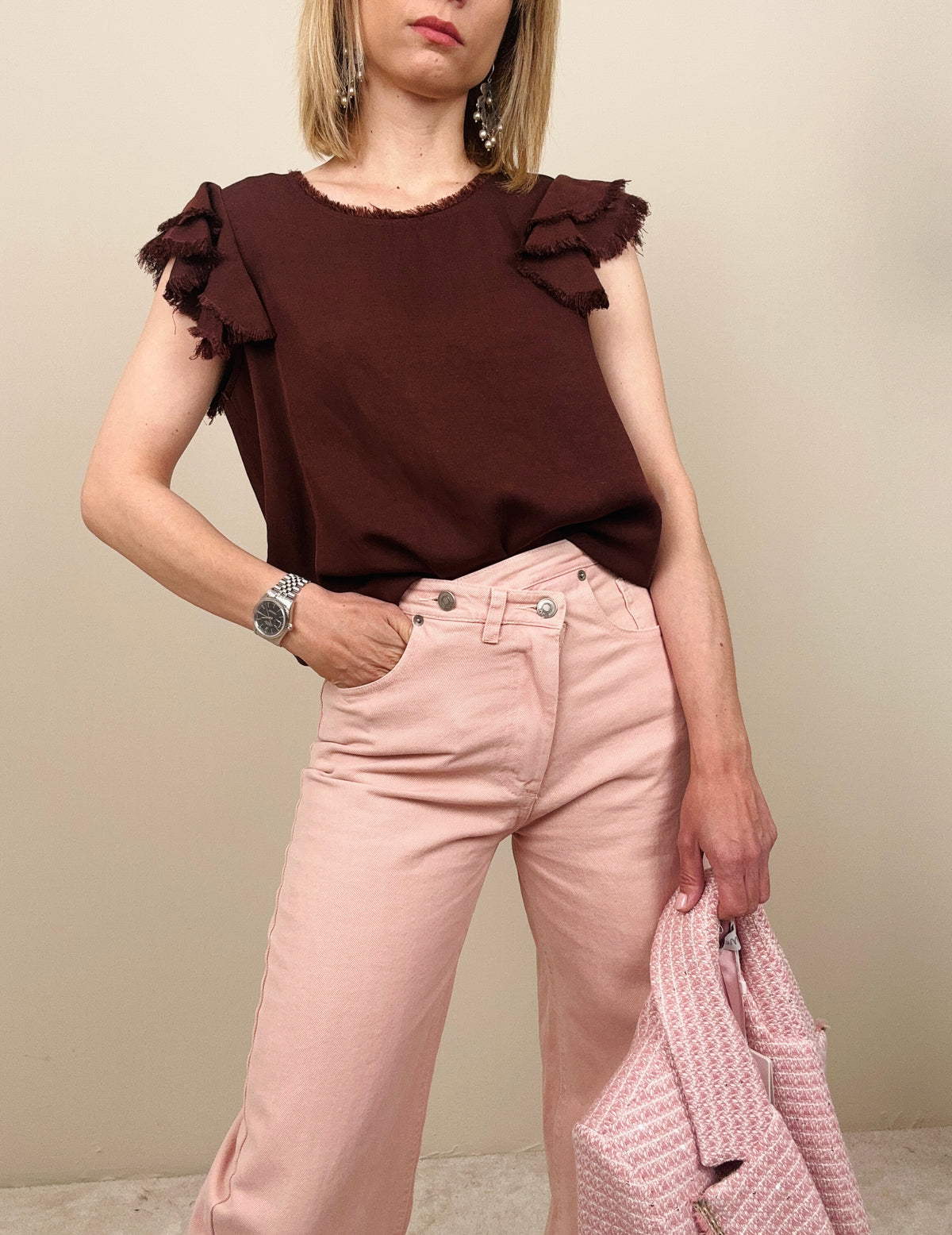 Jeans rosa con chiusura svasata