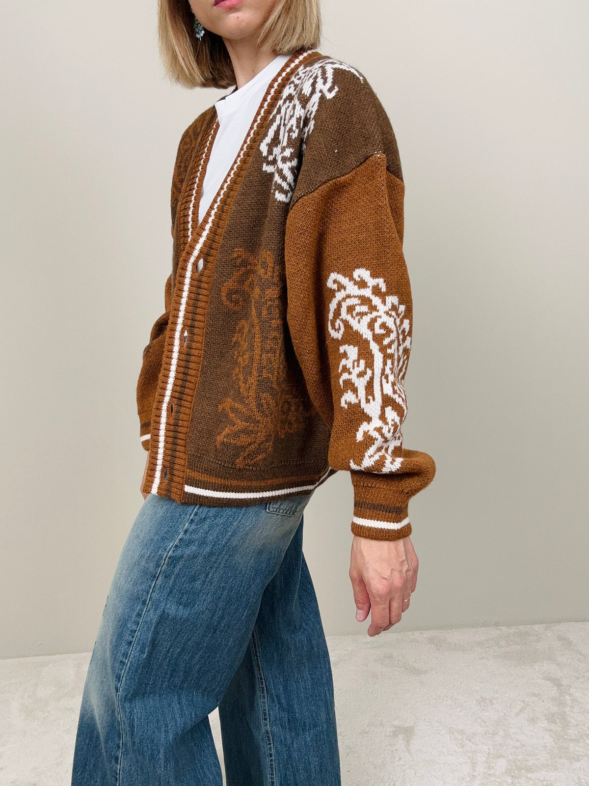 Cardigan fantasia con bottoni