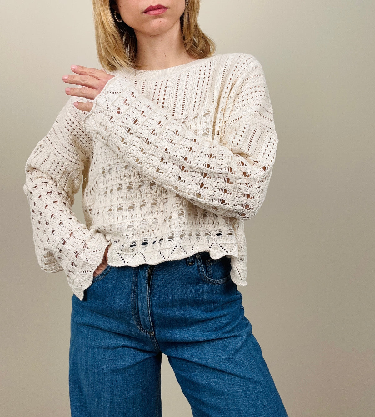 Maglia aperta dietro burro