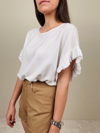 Blusa con manichetta a ruches