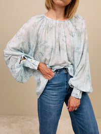 Blusa fiori azzurra