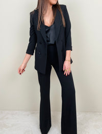 Pantalone zampa nero