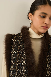 Gilet con pelo e paillettes